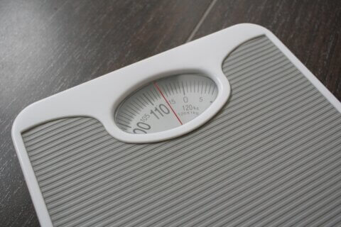 Photograph of a set of scales people use to weigh themselves.