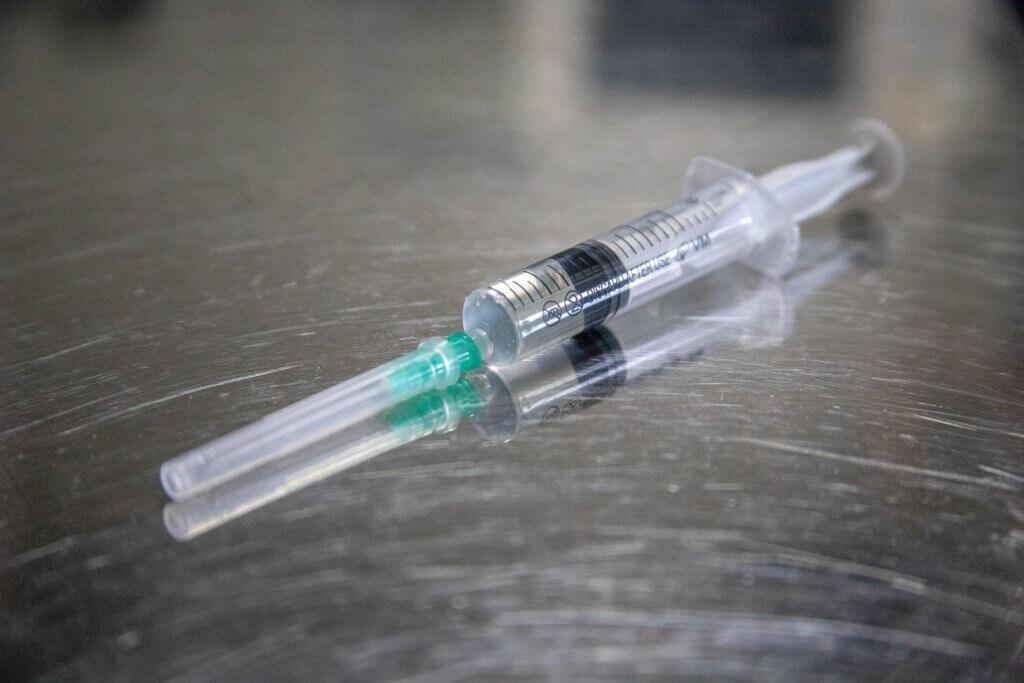 A syringe on a table