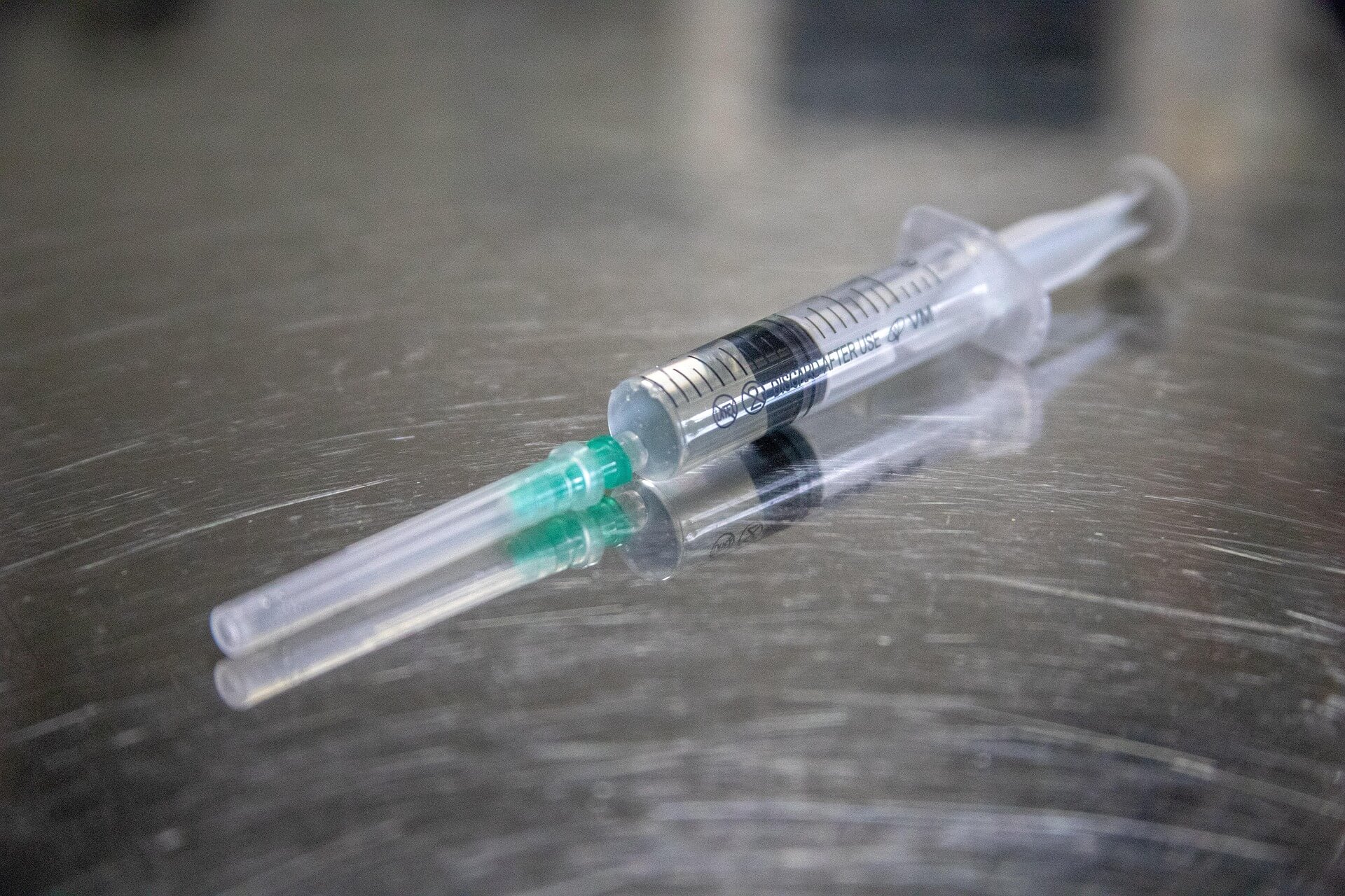 A syringe on a table