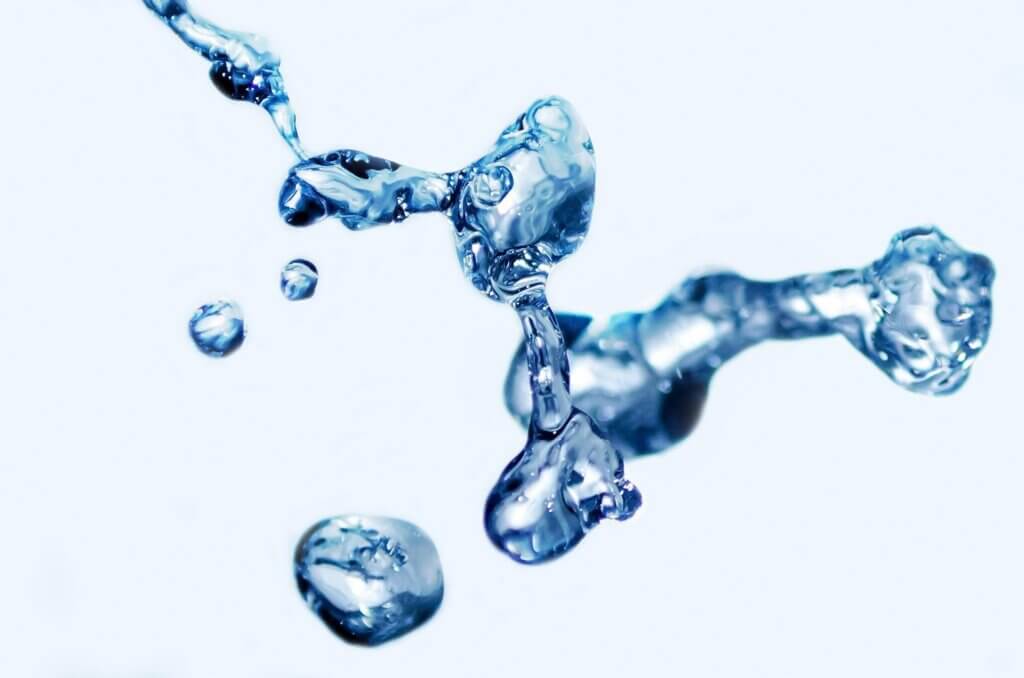 Photo of water droplets in the air