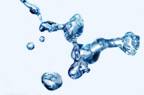Photo of water droplets in the air